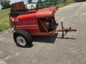 lot 5 image: FMC Trailer Sprayer (non-potable water written on side)