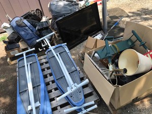 lot 27 image: Large Lot Misc Items  Electrconics, lights, TV, Power Supplies, golf bags, ironing boards