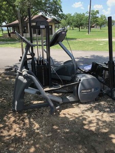 lot 28 image: Exercise Equipment  Precor Elliptical, Star Trac Treadmill, Quantum weight machine