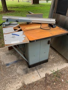 lot 42 image: Delta UniSaw 10 inch Tilting Arbor with large table extensions, 220 volt single phase