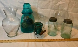 lot 158 image: Mason jars, insulator candle holder, vases, canister