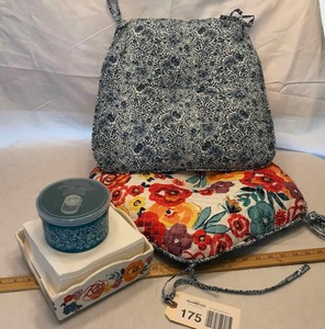 lot 175 image: Pioneer Woman seat cushions, ceramic napkin holder, food storage container