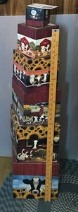 lot 211 image: Cow motif cardboard stacking boxes