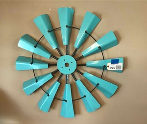 lot 225 image: Wall Decoration turquoise colored windmill blades (36 inch)