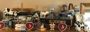 lot 294 image: Cows Coffee cups, butter dish, decorative, canisters, figurines, etc.