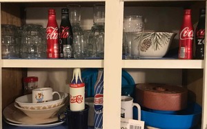 lot 300 image: Assorted dishes, empty product bottles (Coca-Cola, Pepsi cola), glass mugs