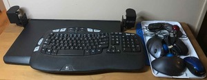lot 333 image: Logitech keyboard, numerous mouses, keyboard holder, camera