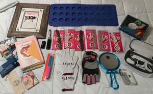 lot 383 image: Hair braiders, gloves, clothes shaver, mirror, cards, tissues, manicure tool, etc.