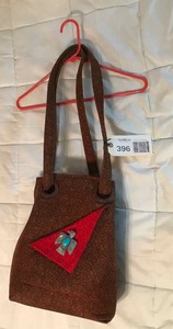 lot 396 image: Quilted bag, brown with with bird pin