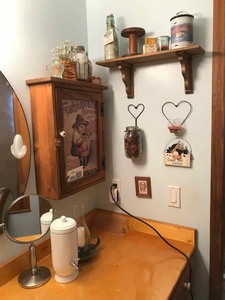 lot 405 image: Wall mounted medicine cabinet, knickknacks, bottles jars, bath decor, mirror, etc.