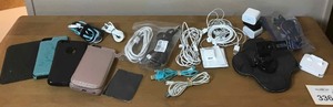lot 336 image: Asst. Cell PhoneDevice Cords, Cases, Garman Holder, Ear Buds