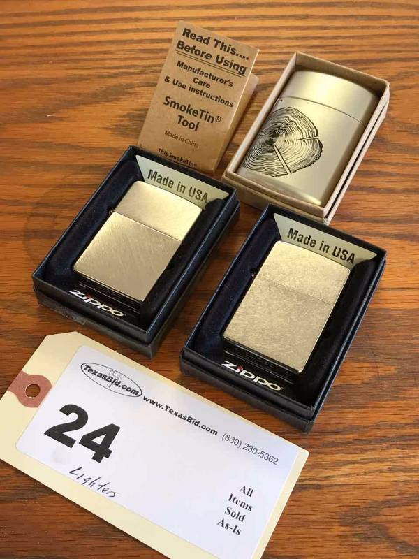 lot 24 image: (2) Lighters, (1) Smoke Tin Tool