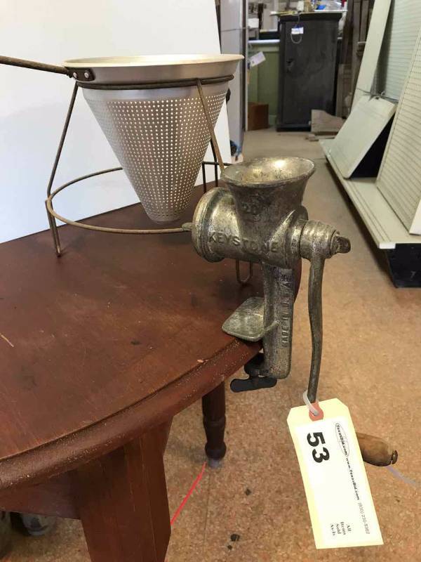 lot 53 image: Keystone Hand Crank Food Grinder, and a Vintage Ricer