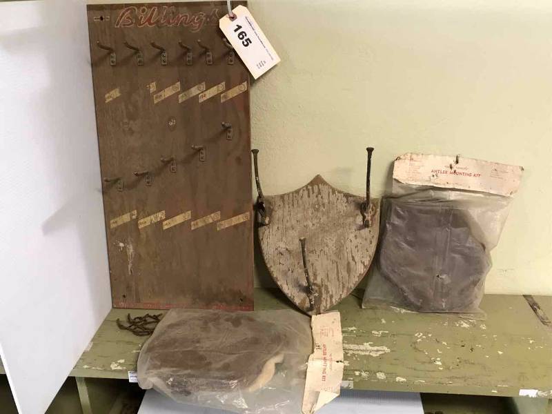 lot 165 image: Old Billings Wood Display Rack with Hooks, Shield Coat Hook Wall Plaque, (2) Shield Wood Mounts for Horns
