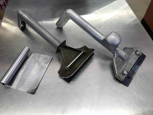 lot 203 image: (2) Grill Scrapers