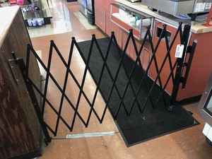 lot 242 image: Metal Security Gate-Divider, accordian style, 42 in tall, five feet opening