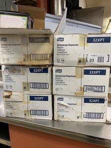 lot 23 image: Tork Napkin Tabletop Dispensers  6 boxes, 4 each