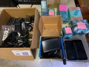 lot 26 image: Older Cell Phones and a GPS, Apple Watch Series 3