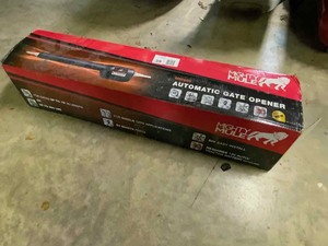 lot 39 image: Mighty Mule MM660 Automatic Gate Opener is Box