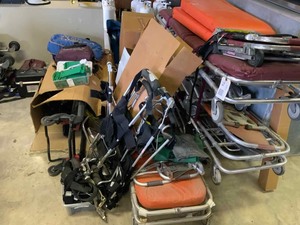 lot 74 image: Asst. Older EMS Devices, Gurneys, Rolling Chairs, Etc.