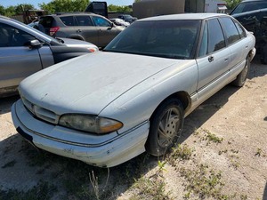 lot 18 image: Stoage Lien Arrest 1993 Pontiac, white, No Keys (VIN 1G2HX53L2P1205068)