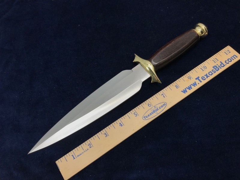 lot 228 image: Knife  Unmarked Dagger, Brass Fittings, Wood Handle