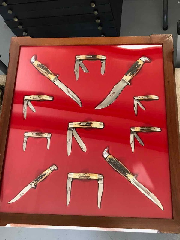 lot 362 image: (11 Pieces)  Collection of Case Knives in a Case (red)