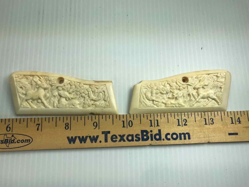 lot 589 image: Carved Ivory Grips ()