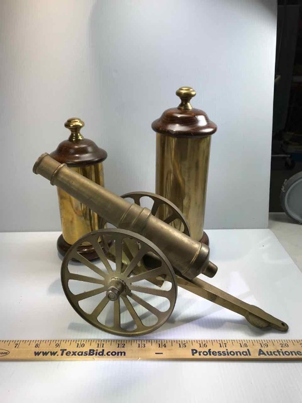 lot 613 image: Brass Desk Top Cannon & (2) Brass Canisters