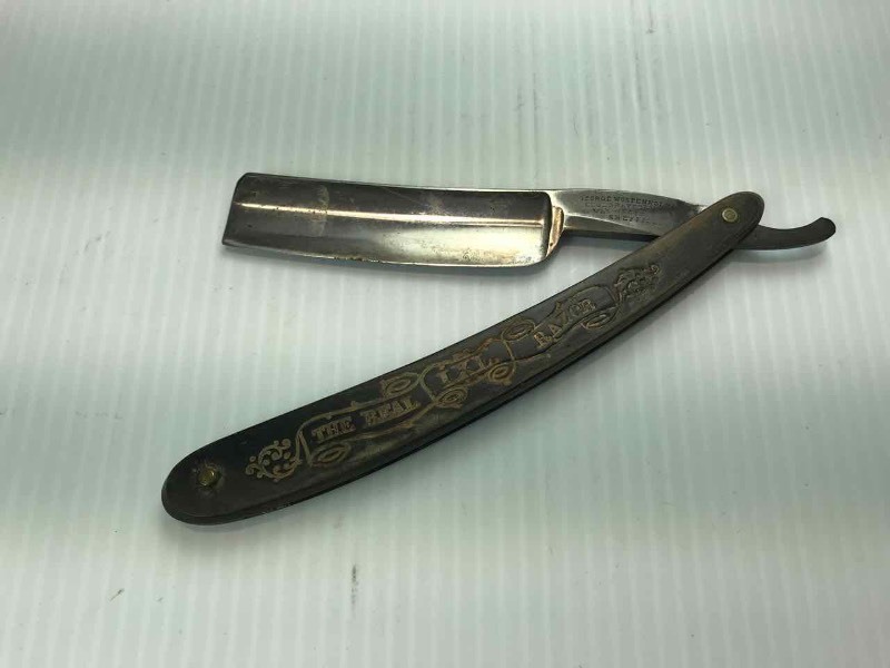lot 711 image: Straight Razor  GeorgeWostenholms Celebrated LXL Washington Works, Sheffield, The Real Razor