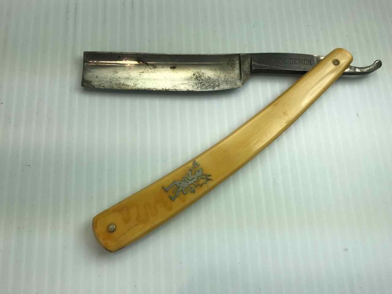 lot 727 image: Straight Razor  Black Demon, T. Noonan & Sons, Boston Mass., Made in Germany