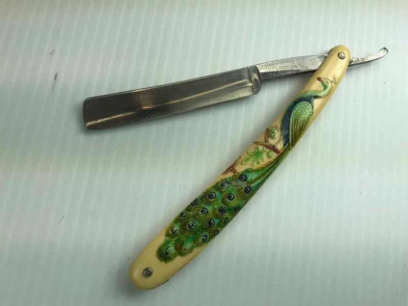 lot 733 image: Straight Razor  Golden Rule Cutlery Co. Chicago (peacock)