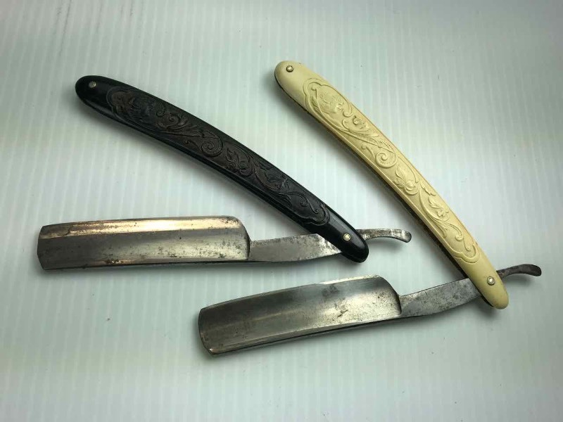 lot 741 image: (2) Straight Razor  Invincible (1 black, 1 white)