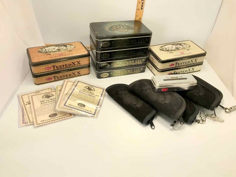 lot 790 image: Empty knife cases and tins.