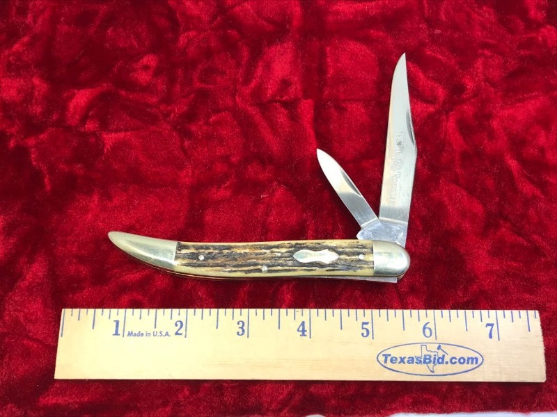 lot 105 image: Knife  Fightn Roster,  two blades, Solingen, Frank Buster Cutlery, Germany, blade approx. 3.75 in.