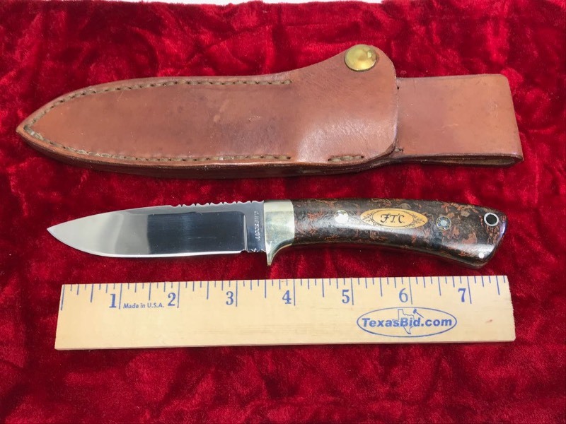 lot 112 image: Custom Knife  Maker C. Wescott, (Cody Wescott) nice filework, has F.T.C. scrimshawed on handle,  approx. 8.25 in. overall