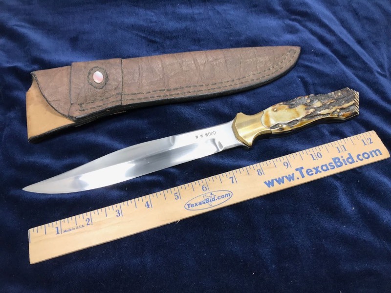 lot 121 image: Custom Knife  Maker  William W. Wood,  (Seymore, Texas),  Sambar Stag, Fighting Knife, #145,  approx. 12.75 in. overall, includes sheath wMother of Pearl inlay