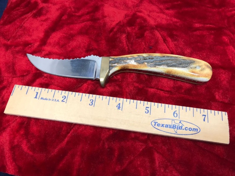 lot 122 image: Custom Knife  Maker L.C. Finger, Sharp Finger Sambar Stag Handle,filework on blade and handle, ot of Kerrville, TX., #724, approx. 7.25 in. overall.