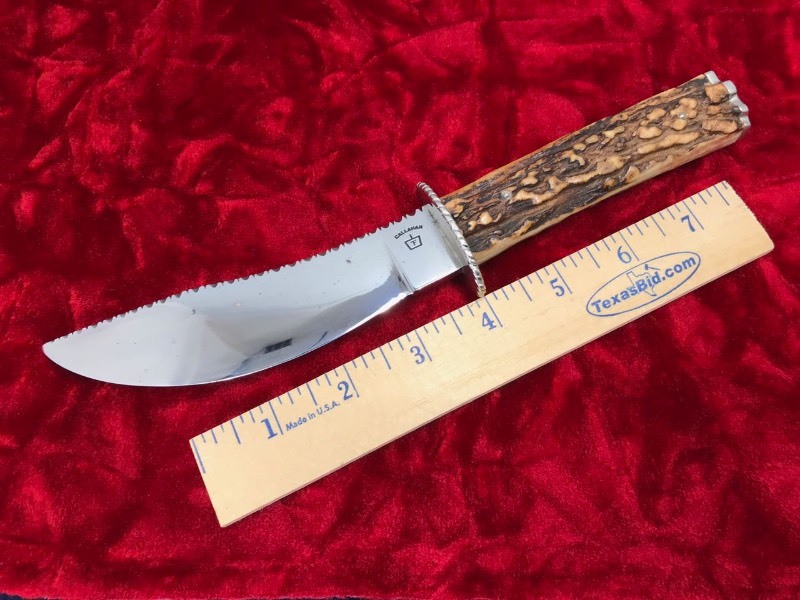 lot 132 image: Custom Knife  Terry Callahan Journeyman Smith Boerne, TX Upswept Skinner, Sambar Stag, Filework on Spine & Guard (5-14in. Blade, 9-34in OA)