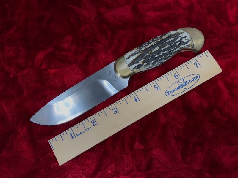 lot 133 image: Custom Knife  William W. Wood Seymour TX 1st Knife 1977 Sambar Stag, Brass Bolsters, Drop Point Knife (Skinner)(marked 22-54)