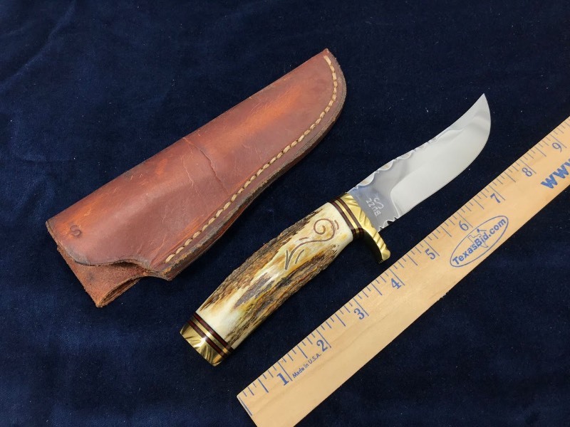 lot 156 image: Knife  Ronald Buzz Travel B Art Hunter Sambar Stag Extensive Filework, Featured in Knifeworld 1984, Coldwater MI