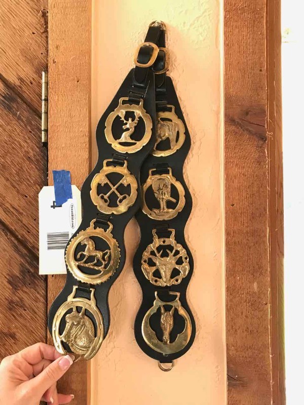 lot 4 image: (2) Trio of Brass Strap Medallions on Leather