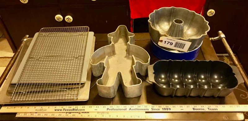lot 179 image: Cake Pans  Little German Guy, Bundt, Cheesecake, Cookie Sheets, Cooling Rack