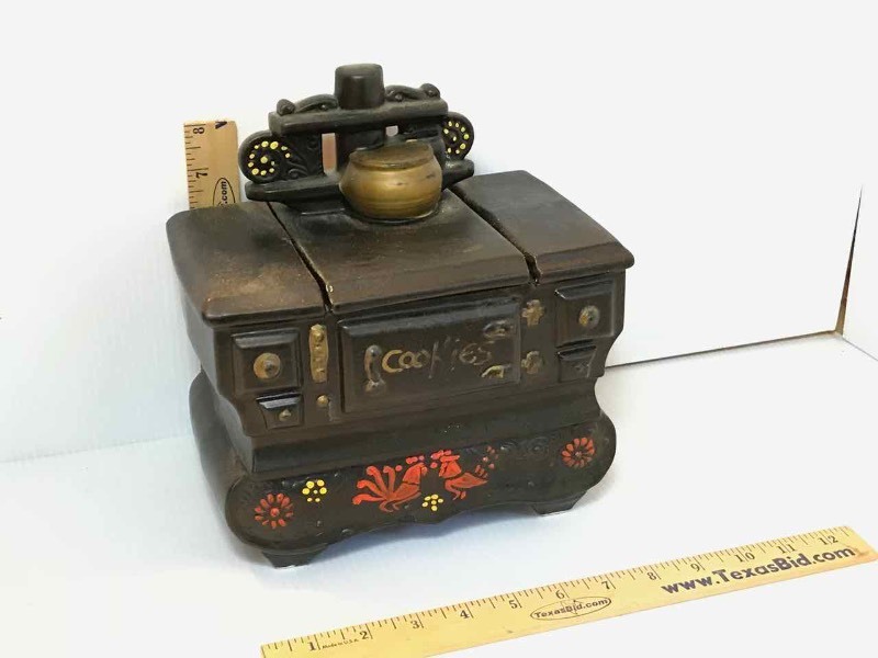lot 192 image: McCoy Ceramic Cookie Jar  Black Cast Iron Stove