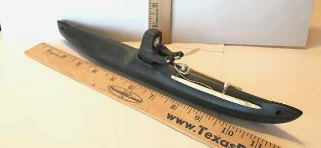 lot 407 image: Carved  Gray Stone with Ivory, signed Nuglene Elim Alaska (kayak)