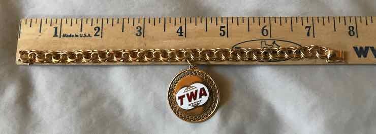 lot 487 image: 14K TWA Charm & Bracelet