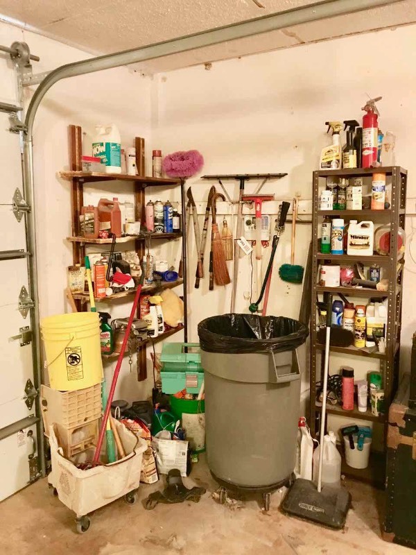 lot 593 image: Contents of Shelves  Yard Chemicals, Car Chemicals, Mop Bucket, Trash Can on Wheels, Etc.