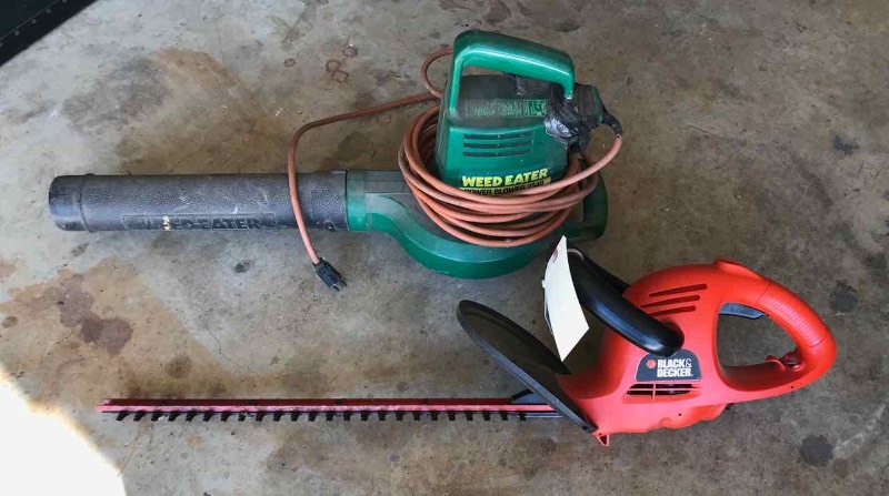 lot 597 image: Black & Decker Hedge Trimmer and a Weedeater Brand Blower