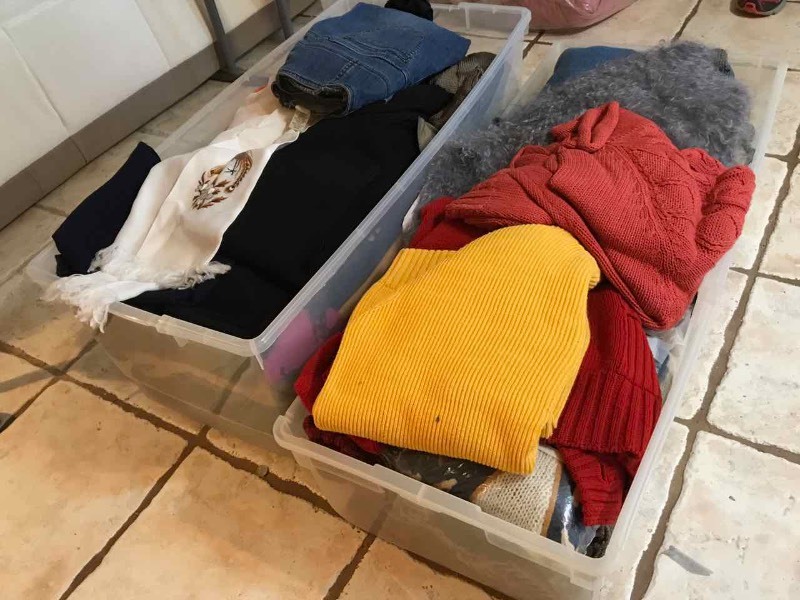 lot 252 image: (2) Storage Tubs of Sweaters, Jeans, Scarves, Shorts, Etc.
