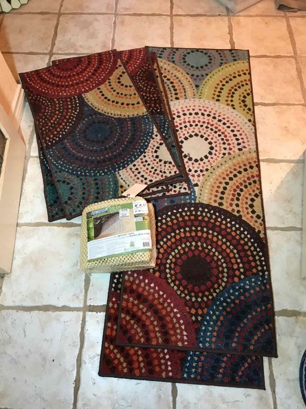 lot 306 image: (6) Area Rugs  Bright Dotted Circles and a package of non-slip rug pad